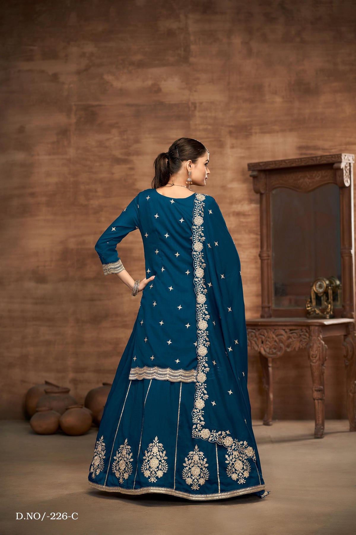 Anaita Teal Premium Embroidered Vichitra Silk Lehenga Style Suit | Grocsy