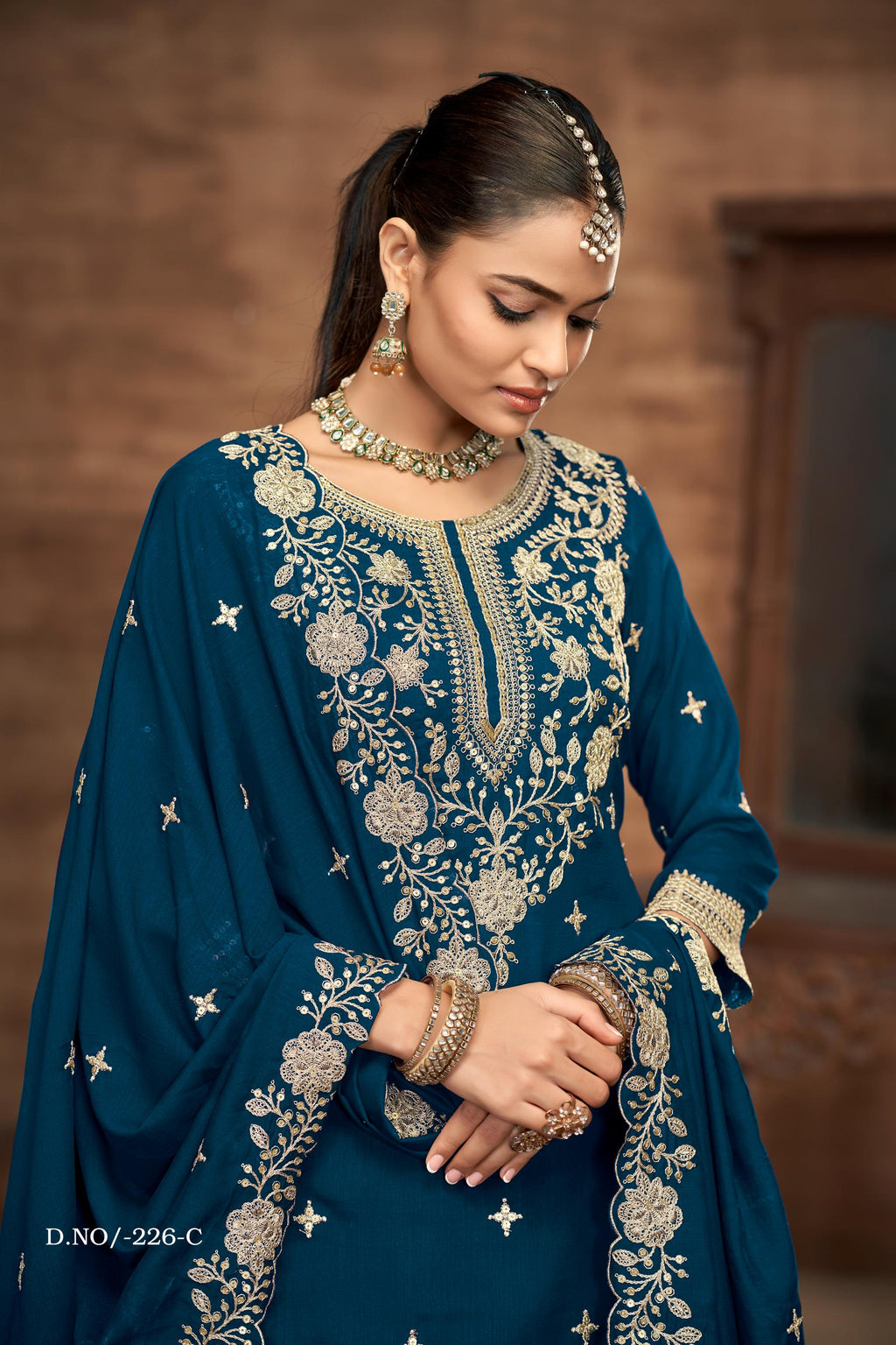 Anaita Teal Premium Embroidered Vichitra Silk Lehenga Style Suit | Grocsy