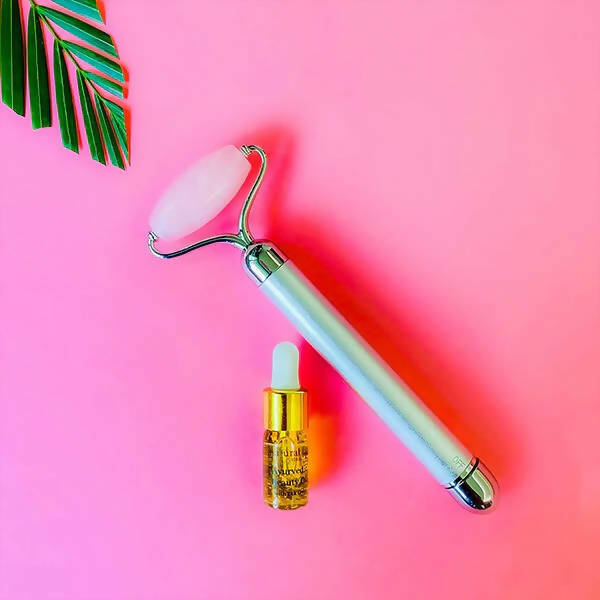 Natural Vibes Rose Quartz Vibrating Face Massage Roller with Free Gold Beauty Elixir Oil | Grocsy