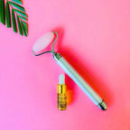 Natural Vibes Rose Quartz Vibrating Face Massage Roller with Free Gold Beauty Elixir Oil | Grocsy