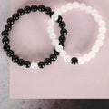 NVR Men & Women White & Black Marbel Crystal Elasticated Bracelet | Grocsy