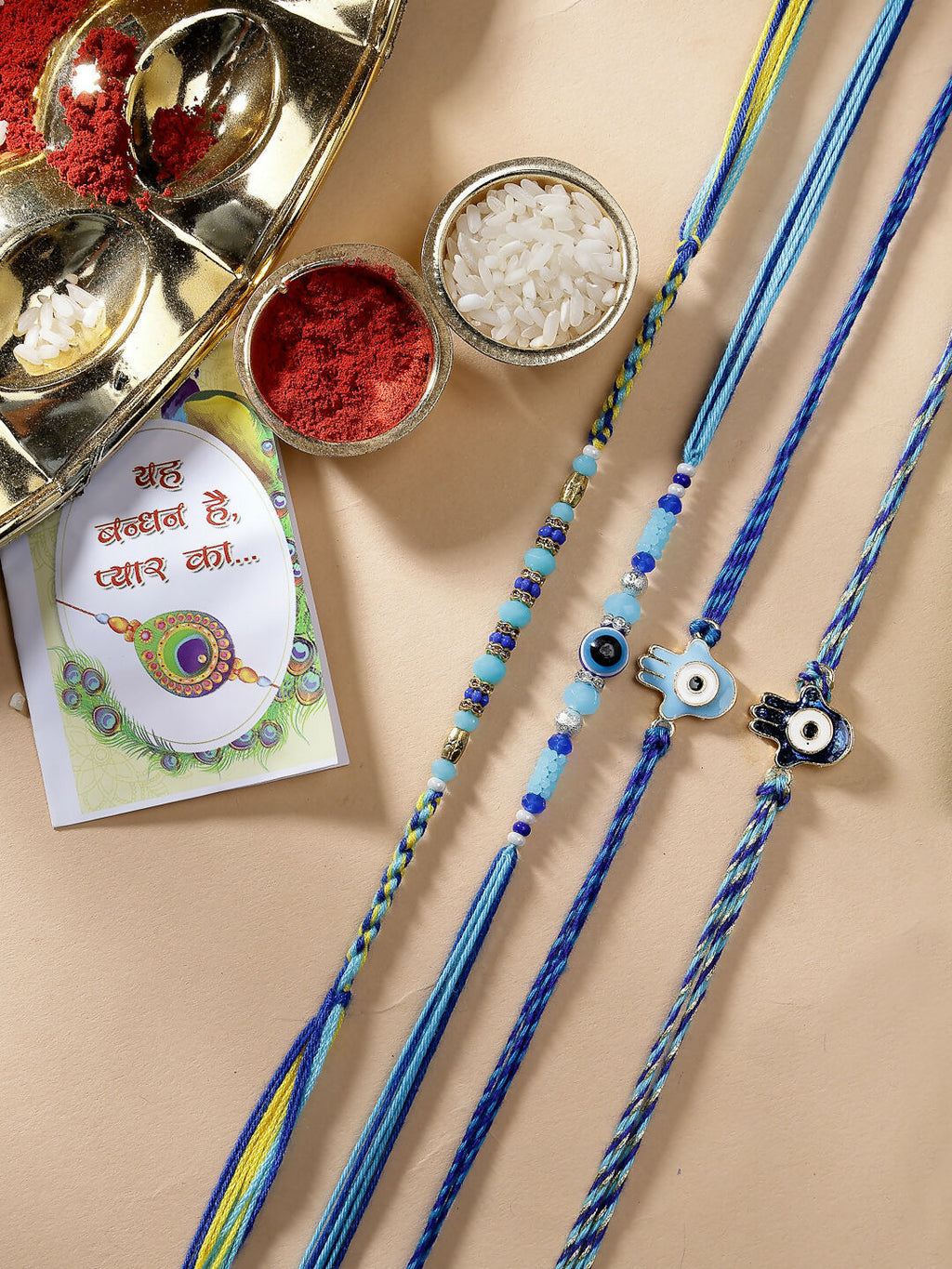 NVR Women & Men Set of 4 Blue Evil Eye Charm Rakhi With Roli Chawal | Grocsy