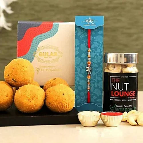Feng Shui Rakhi With Besan Laddoo & Cashew Jar | Grocsy