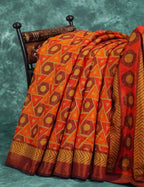 Orange and brown mix geometrical print Semi Chanderi Saree. By Gayathri Reddy Designer Studio | Grocsy