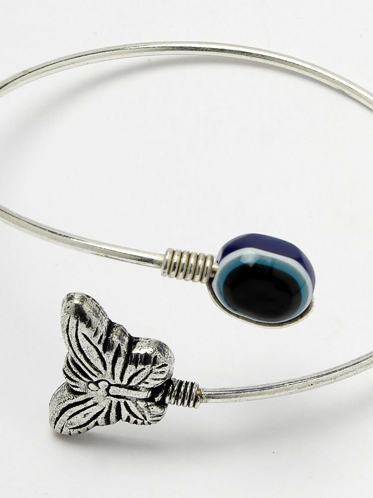 NVR Women Rhodium Plated Evil Eye Kada Bracelet | Grocsy