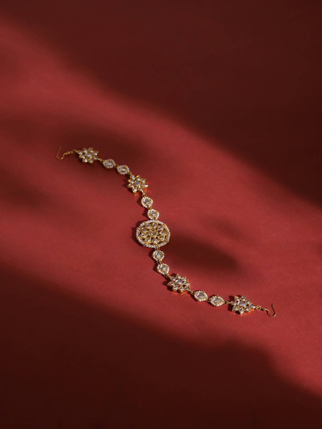 Gold-Polished White Kundan-Studded Pearl Beaded Hair Band - Ruby Raang | Grocsy