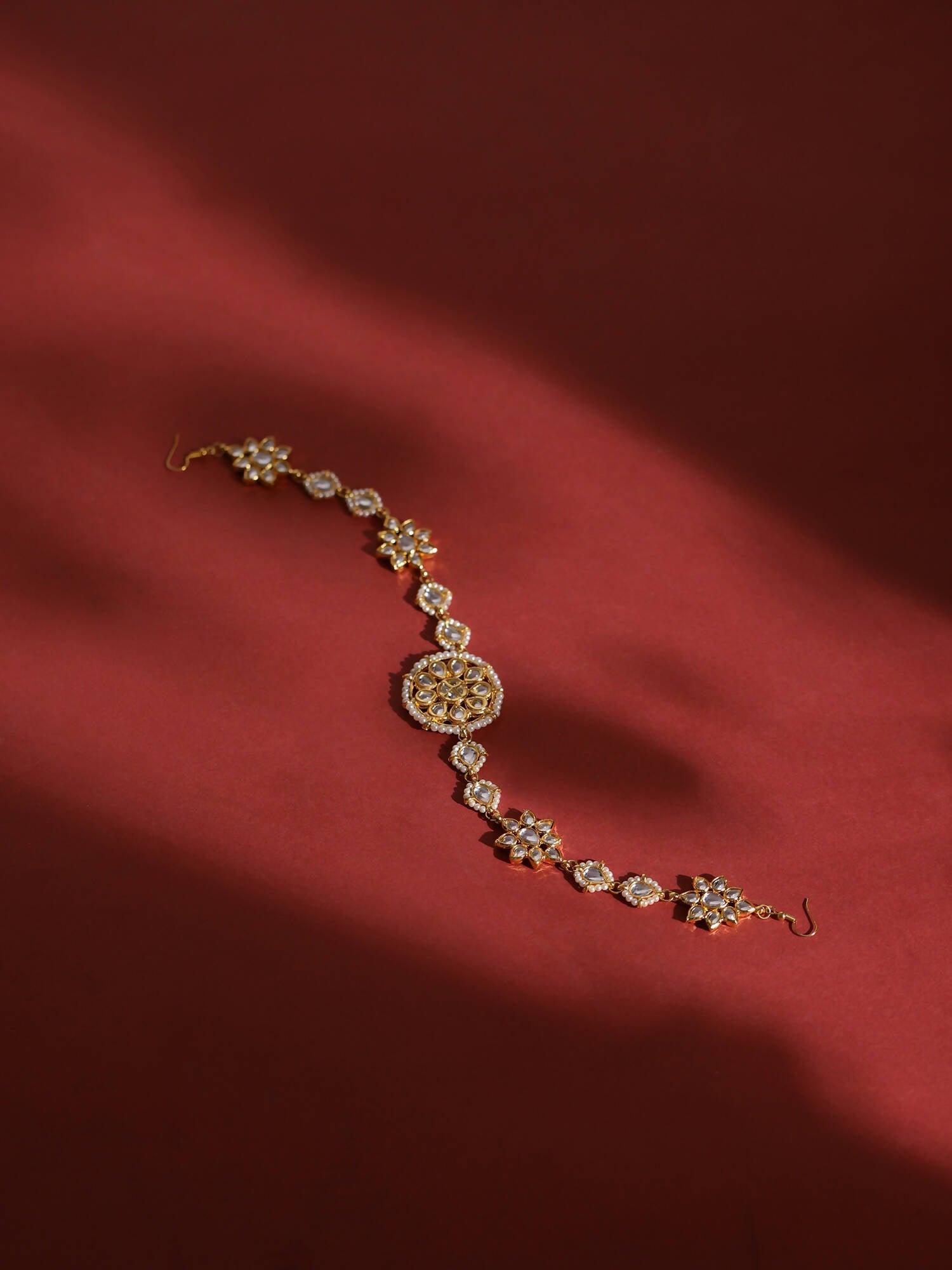 Gold-Polished White Kundan-Studded Pearl Beaded Hair Band - Ruby Raang | Grocsy