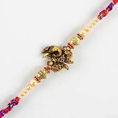 Ganesha Rakhi & Cadbury Silk In Best Bro Sleeve | Grocsy