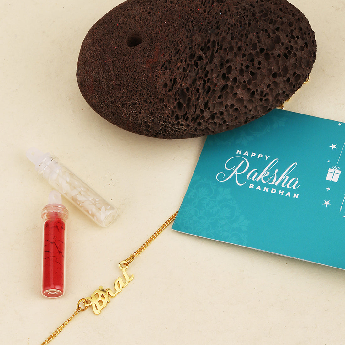 trueBrowns X Voylla Gold-Toned 'Bhai' Bracelet Rakhi With Roli Chaawal Pack | Grocsy