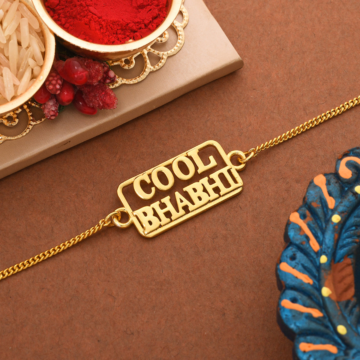 trueBrowns Stylish Gold-Polished Cool Bhabhi Bracelet Rakhi | Grocsy