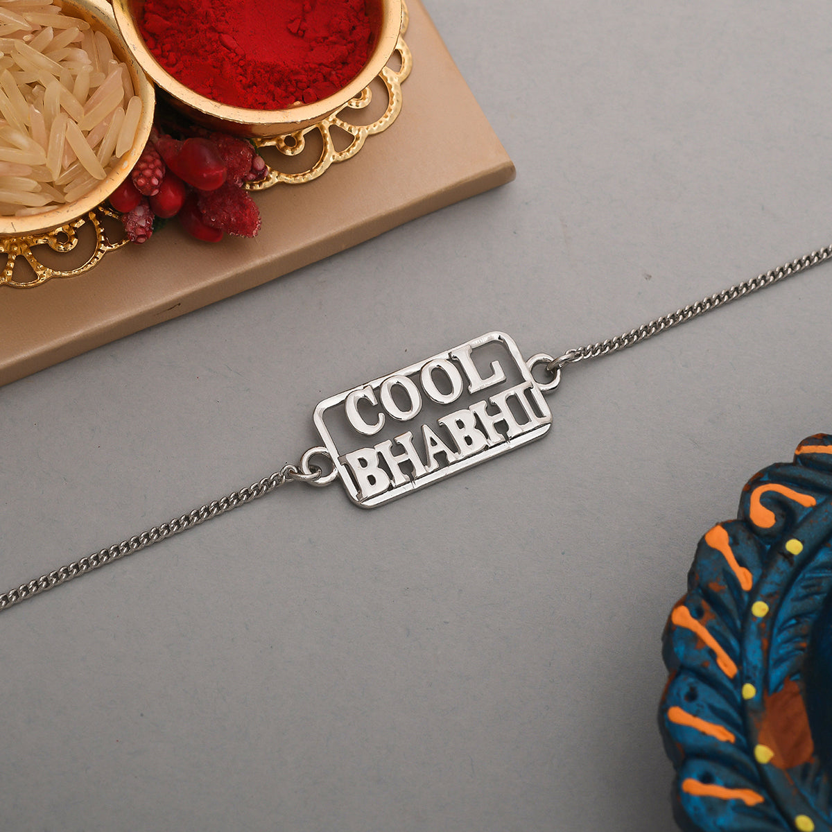 trueBrowns Designer Silver Tone Cool Bhabhi Bracelet Style Rakhi | Grocsy