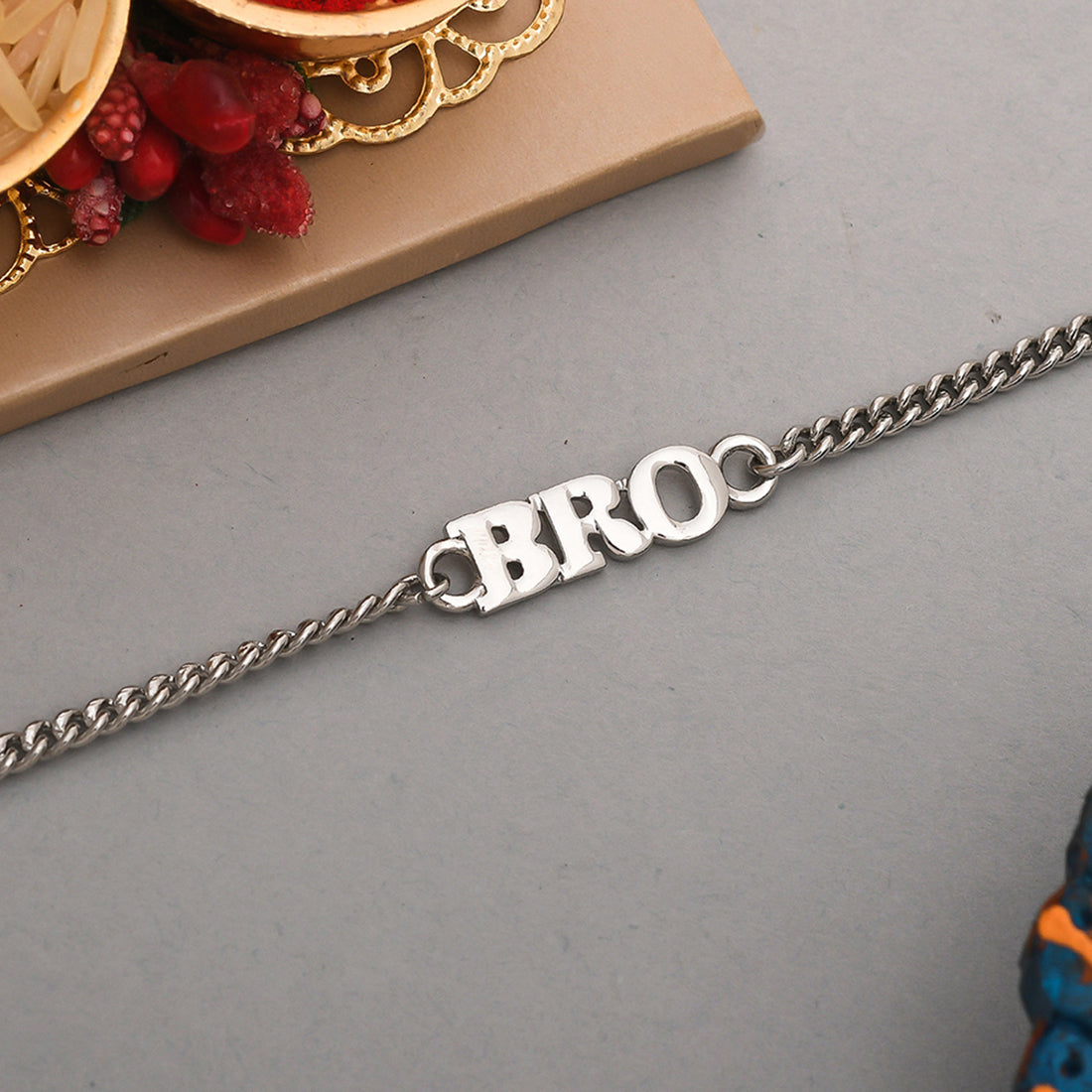 trueBrowns Silver Tone Fashionable BRO Bracelet Rakhi | Grocsy