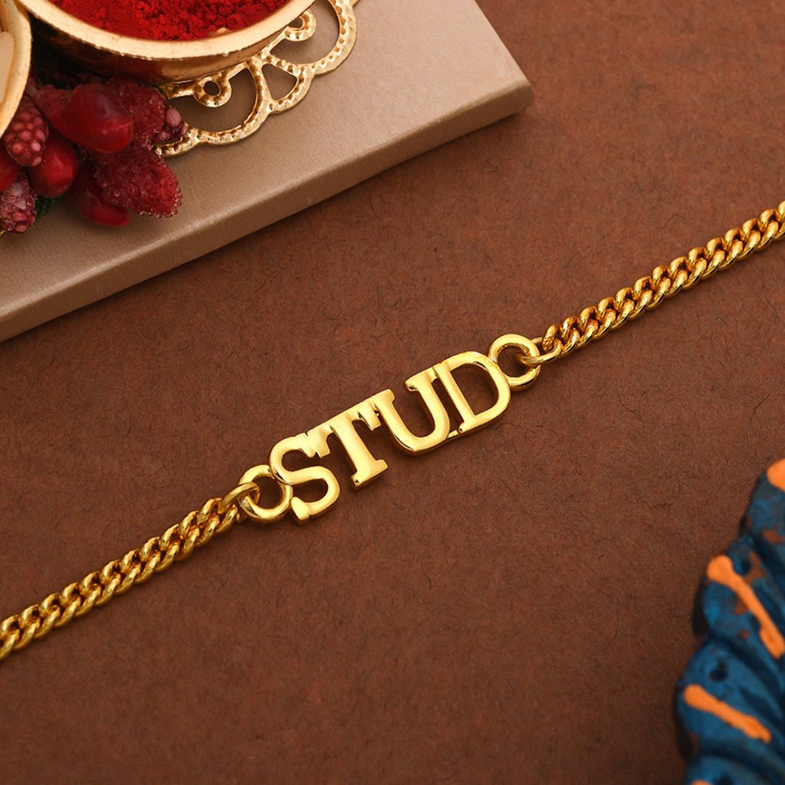 trueBrowns Stylish Gold Tone STUD Rakhi | Grocsy