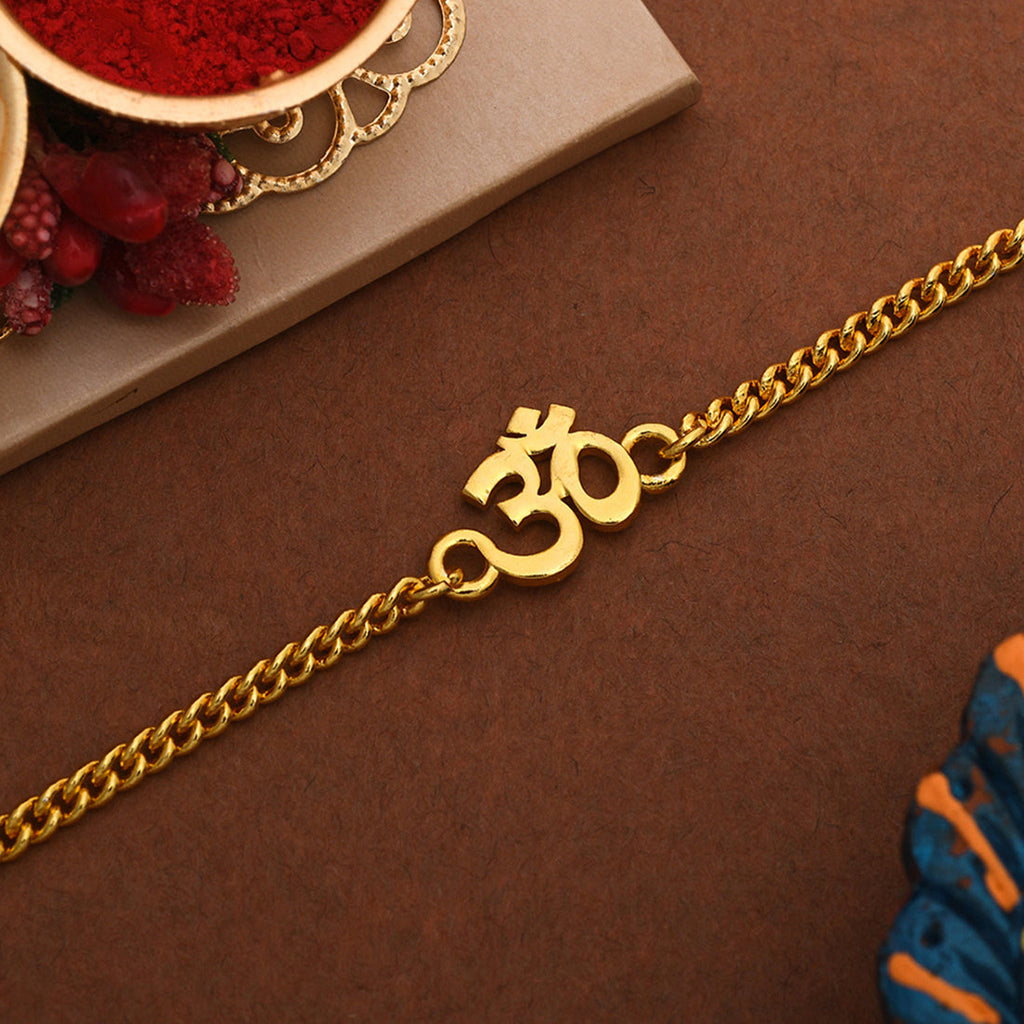 trueBrowns Auspicious Gold Tone Brass Om Bracelet Style Rakhi | Grocsy