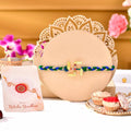 trueBrowns X Voylla Gold Navratan Swastik Rakhi For Brother | Grocsy