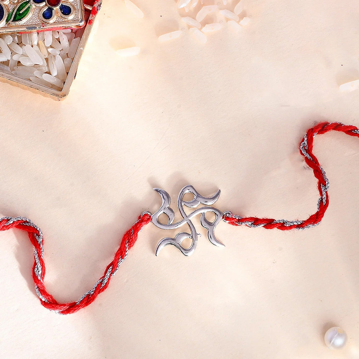 trueBrowns X Voylla Sterling Silver Stylized Swastik Rakhi | Grocsy