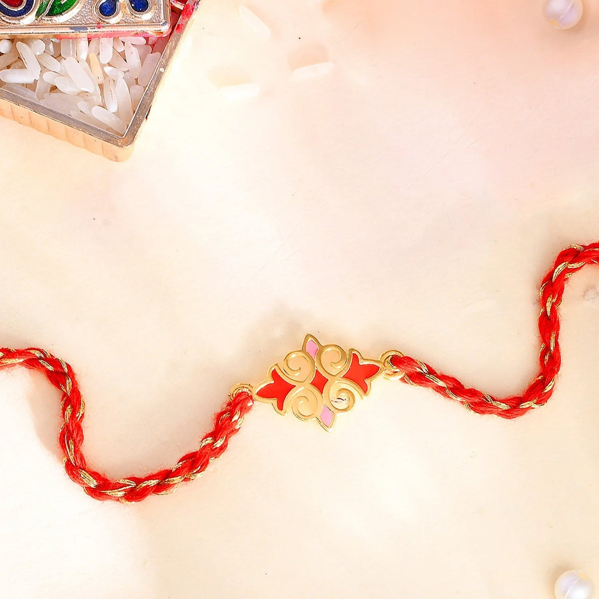 trueBrowns X voylla Sterling Silver Red Gold-Polished Floral Rakhi | Grocsy