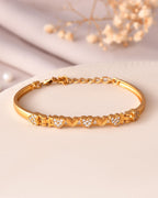 VOJ Women Gold Polished Heart Shaped Stone Studded Link Bracelet | Grocsy