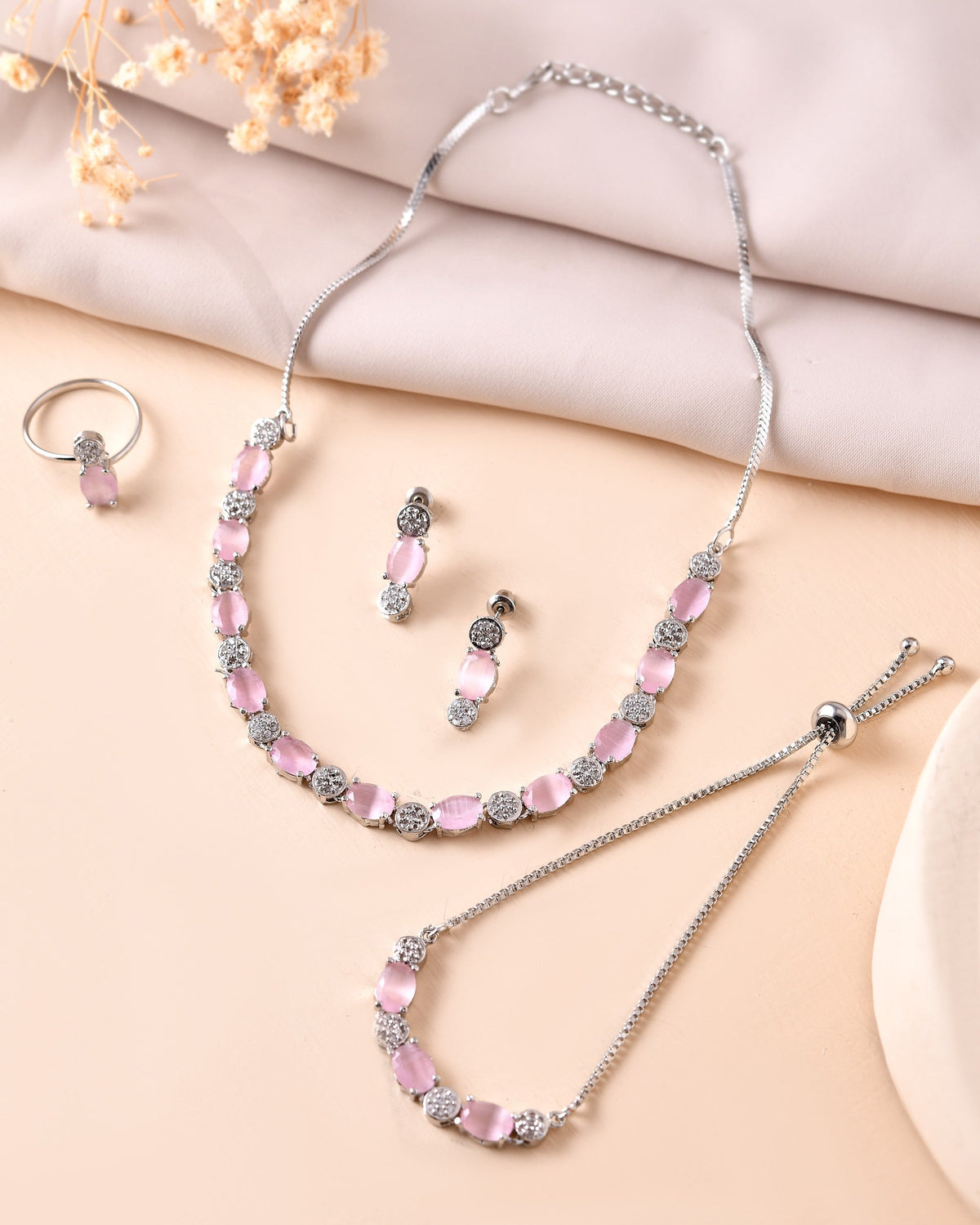 VOJ Silver Plated Baby Pink Stone Studded Necklace With Earrings, Ring And Bracelet Set | Grocsy