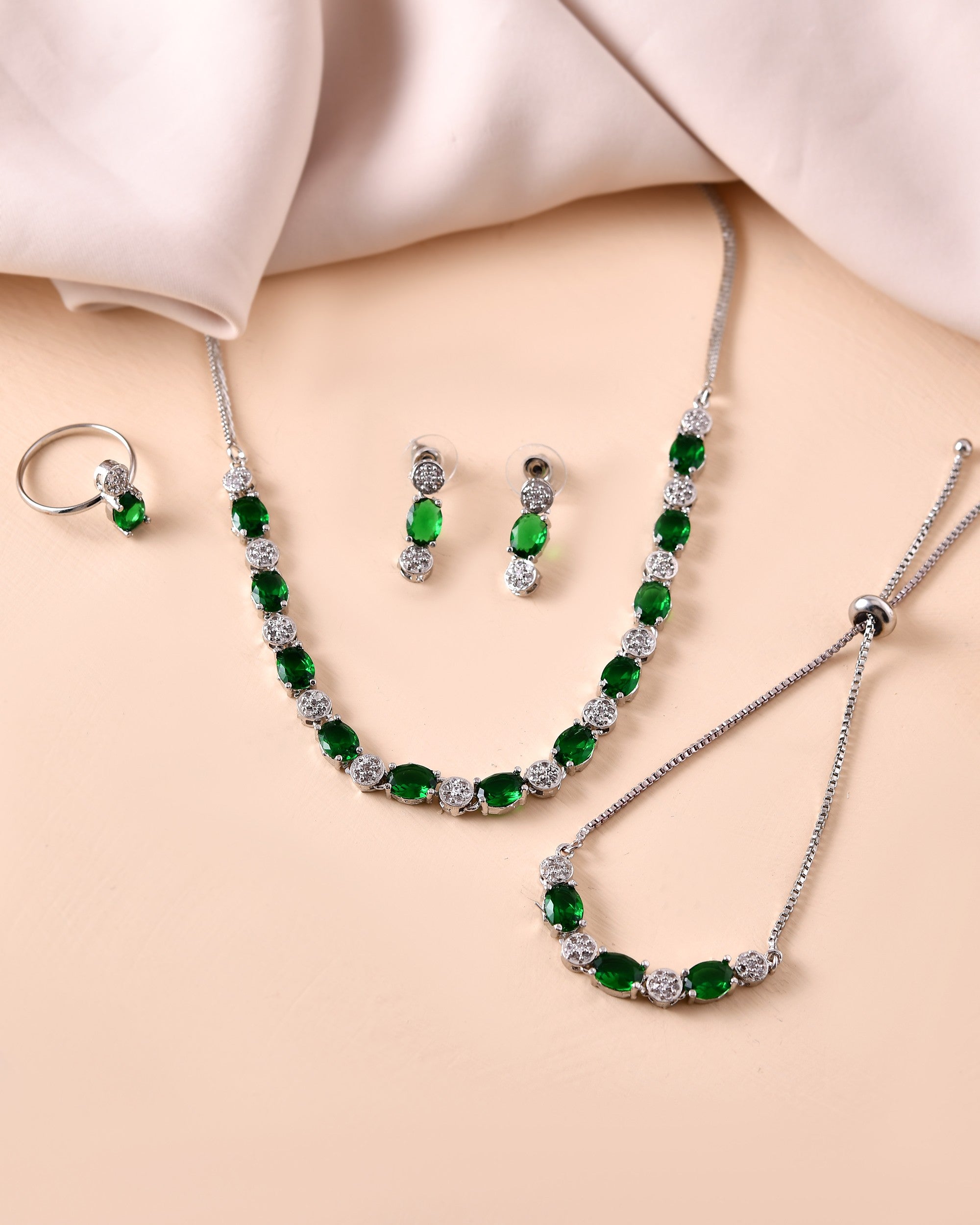 VOJ Silver Plated Green Stone Studded Necklace With Earrings, Ring And Bracelet Set | Grocsy