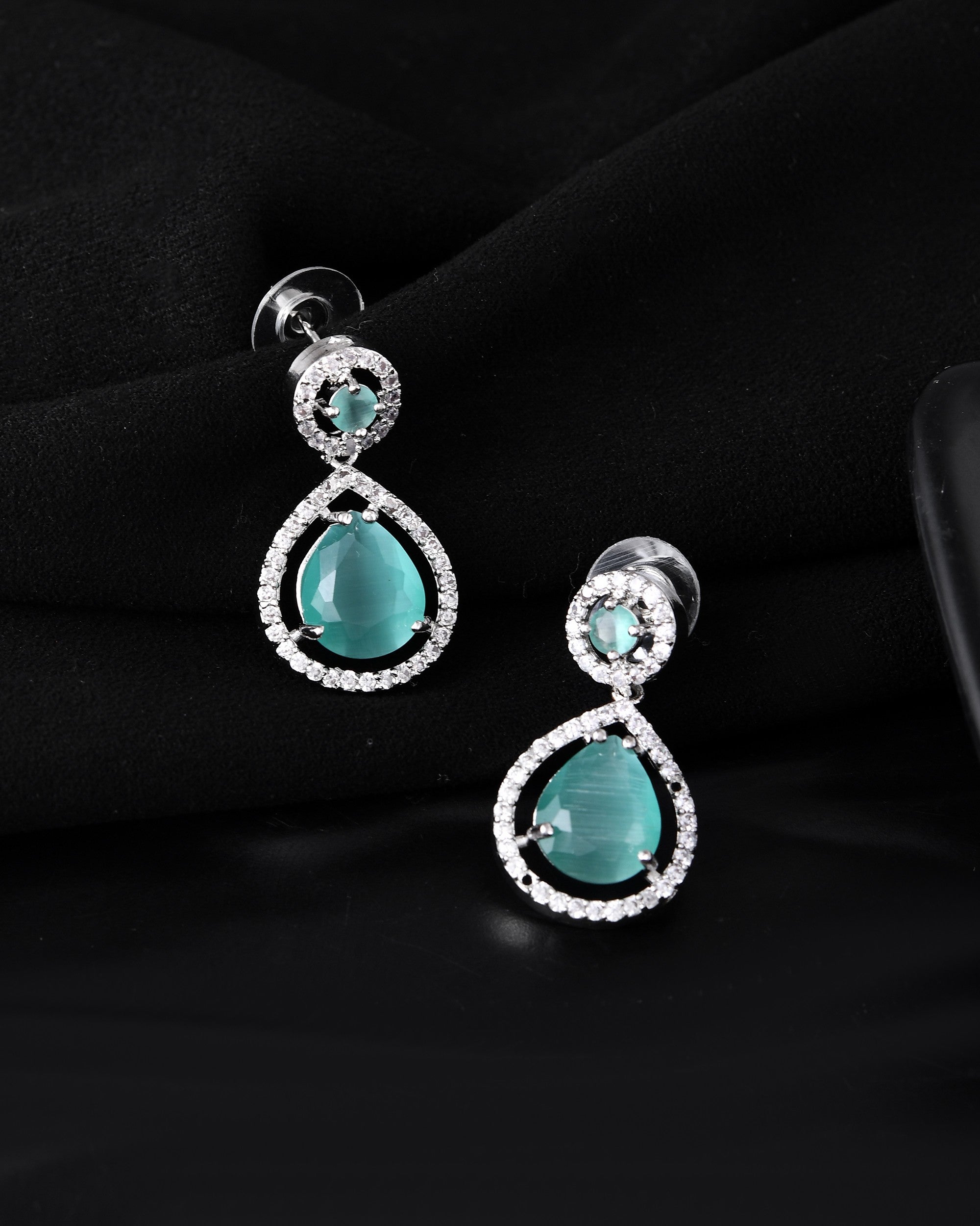 VOJ Silver Plated Sea Green Stone Studded Teardrop Shaped Earrings | Grocsy