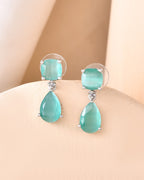 VOJ Silver Plated Sea Green Stone Studded Studs Earrings | Grocsy