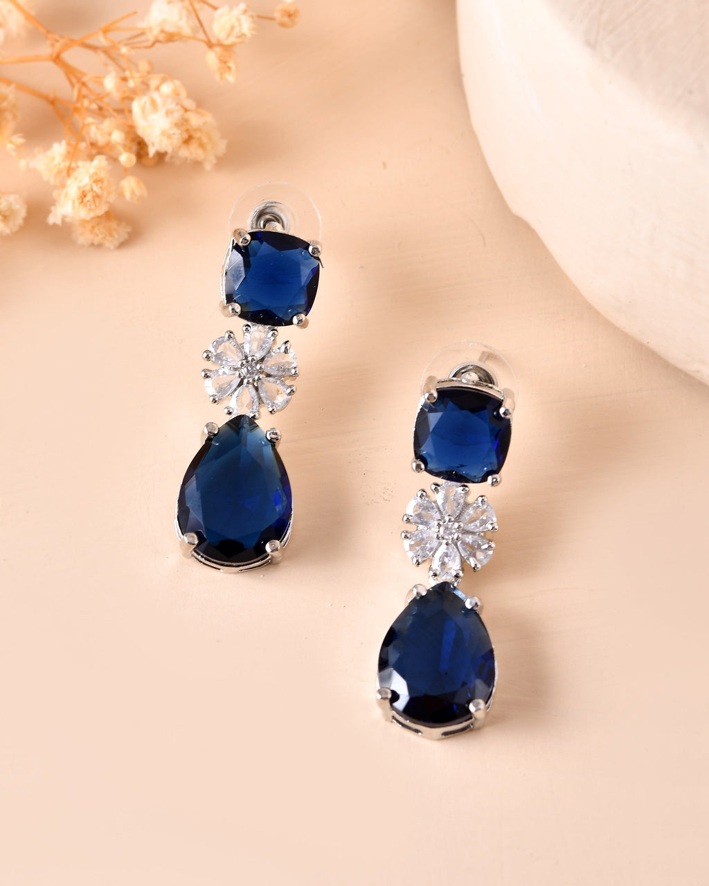 VOJ Silver Plated Blue Stone Studded Floral Shaped Studs Earrings | Grocsy