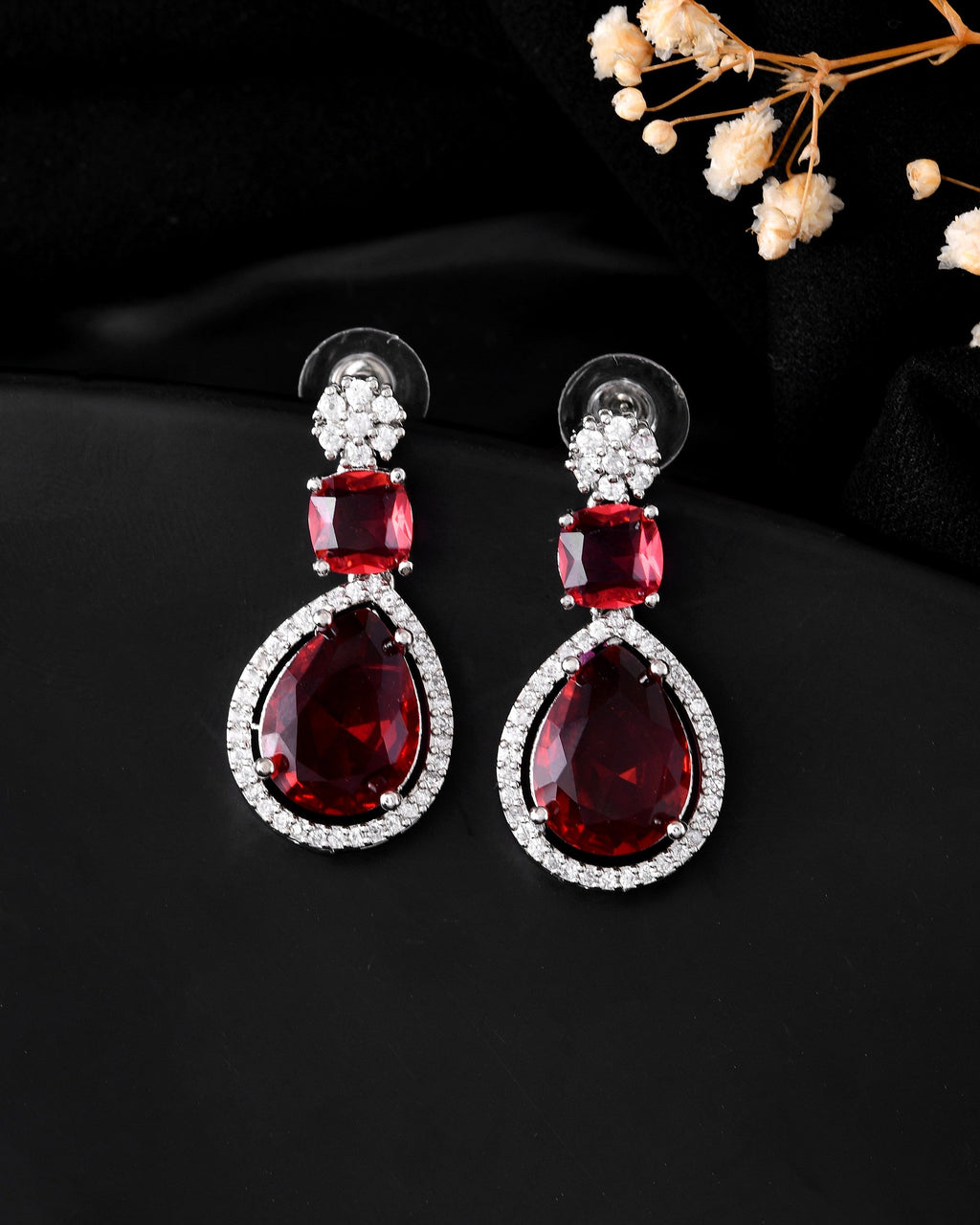 VOJ Silver Plated Red Stone Studded Ad Earrings | Grocsy