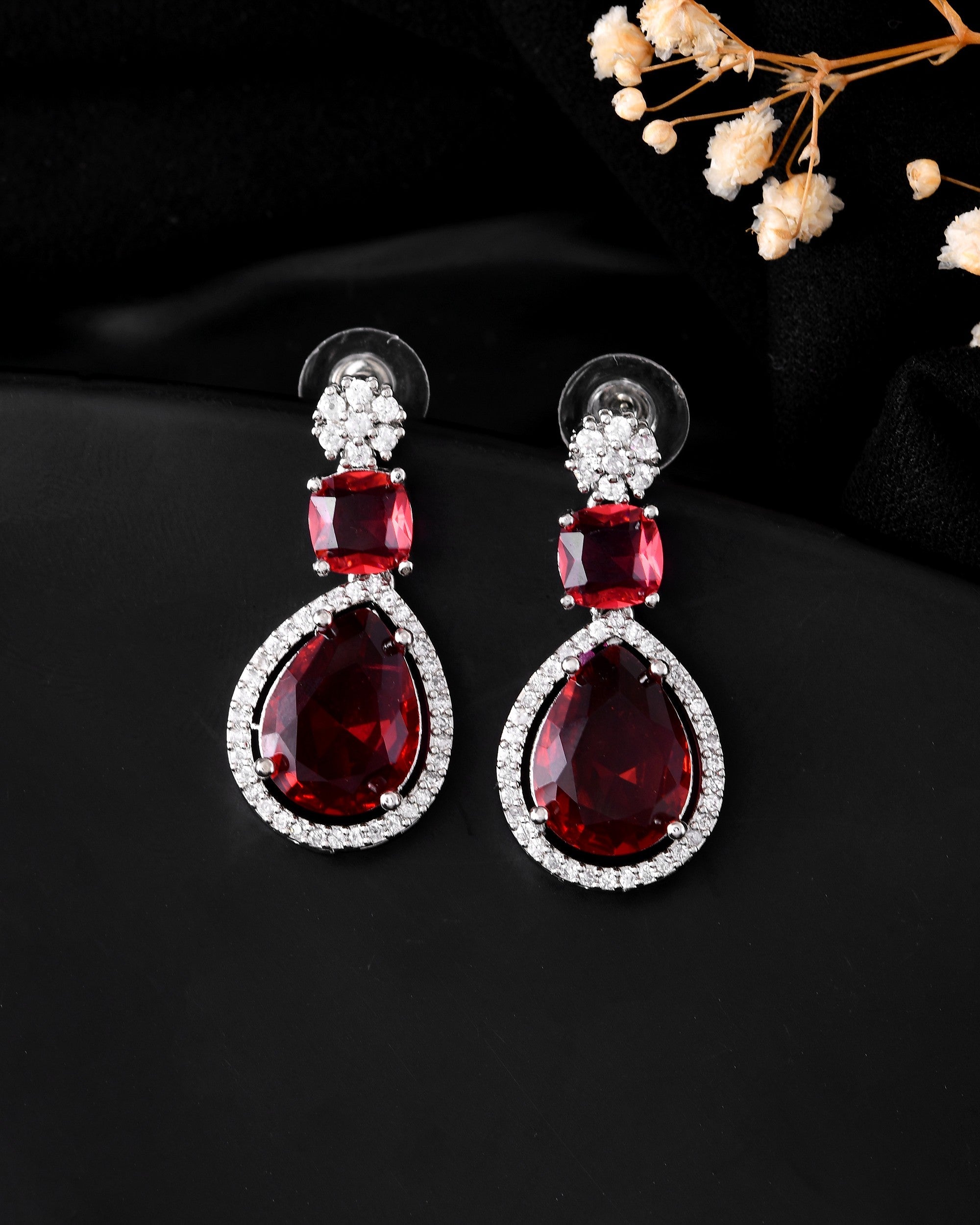 VOJ Silver Plated Red Stone Studded Ad Earrings | Grocsy