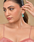 VOJ Silver Plated Sea Green Stone Studded Ad Earrings | Grocsy