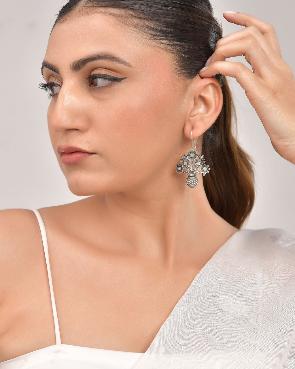 VOJ Silver Plated Floral Shaped Oxidized Drop Earrings | Grocsy