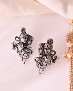 VOJ Silver Plated Oxidized Kanha Shaped Earrings | Grocsy