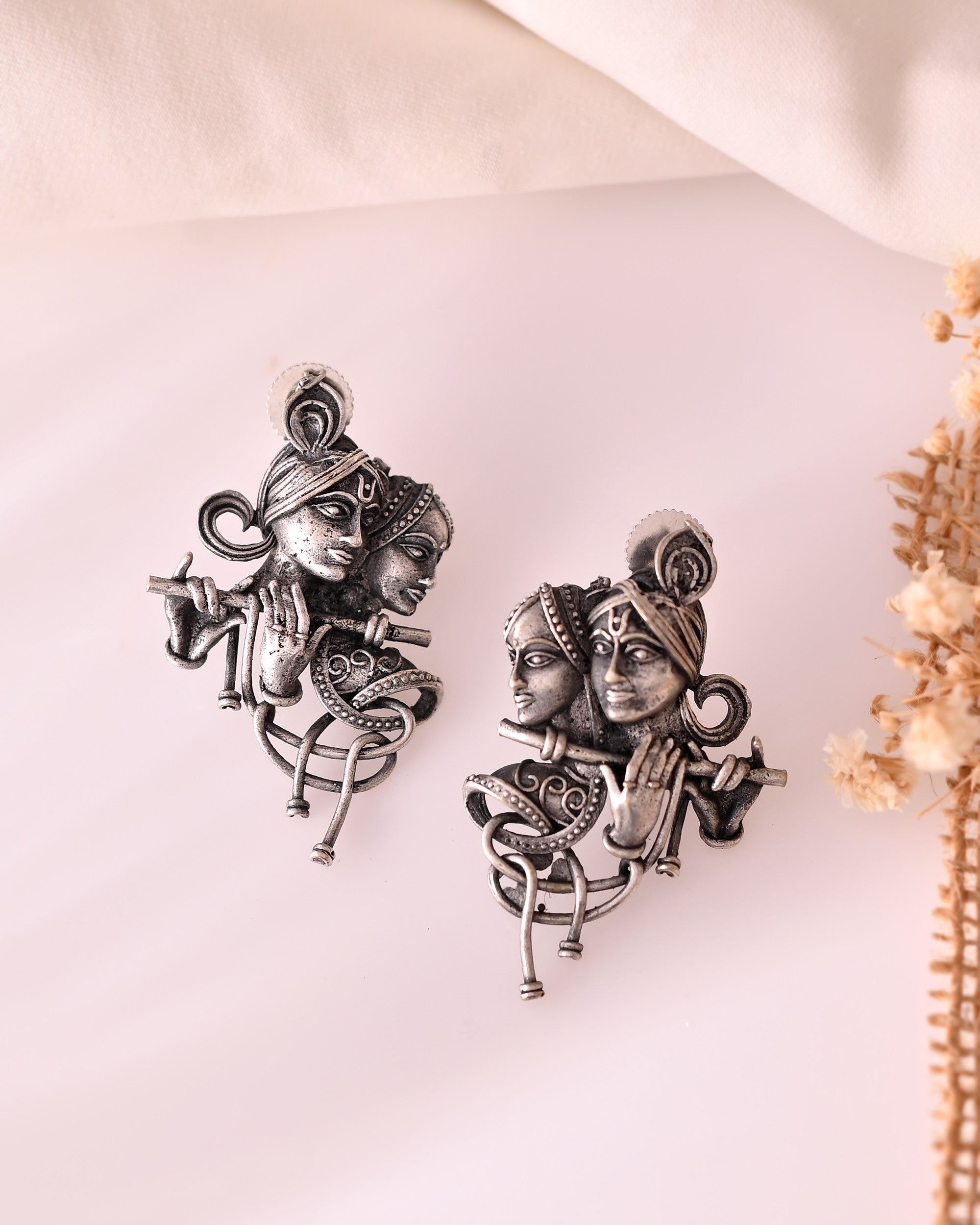 VOJ Silver Plated Oxidized Kanha Shaped Earrings | Grocsy