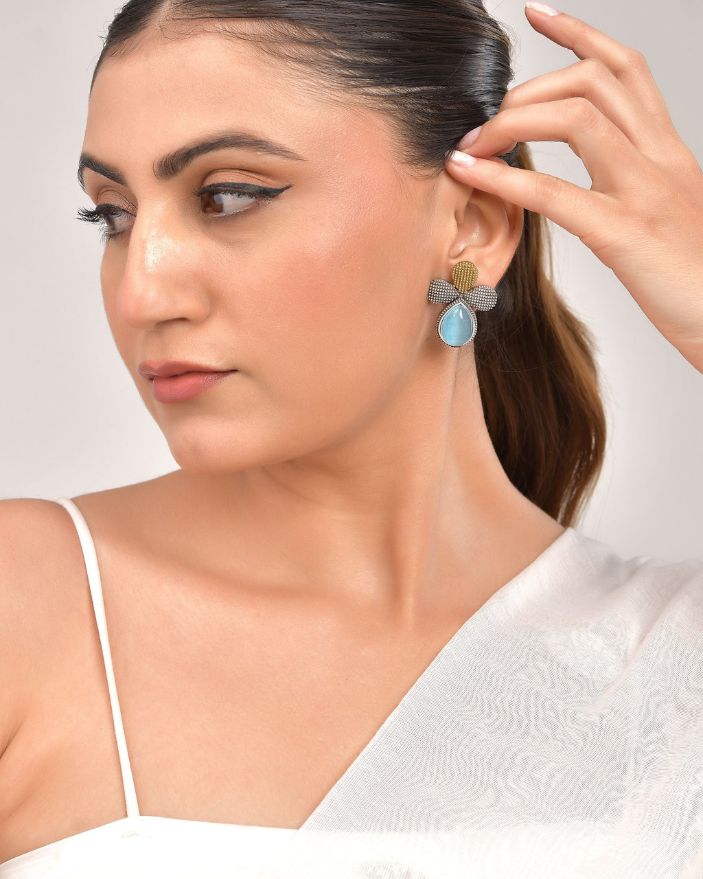 VOJ Silver Toned Blue Stone Studded Elegant Earrings | Grocsy
