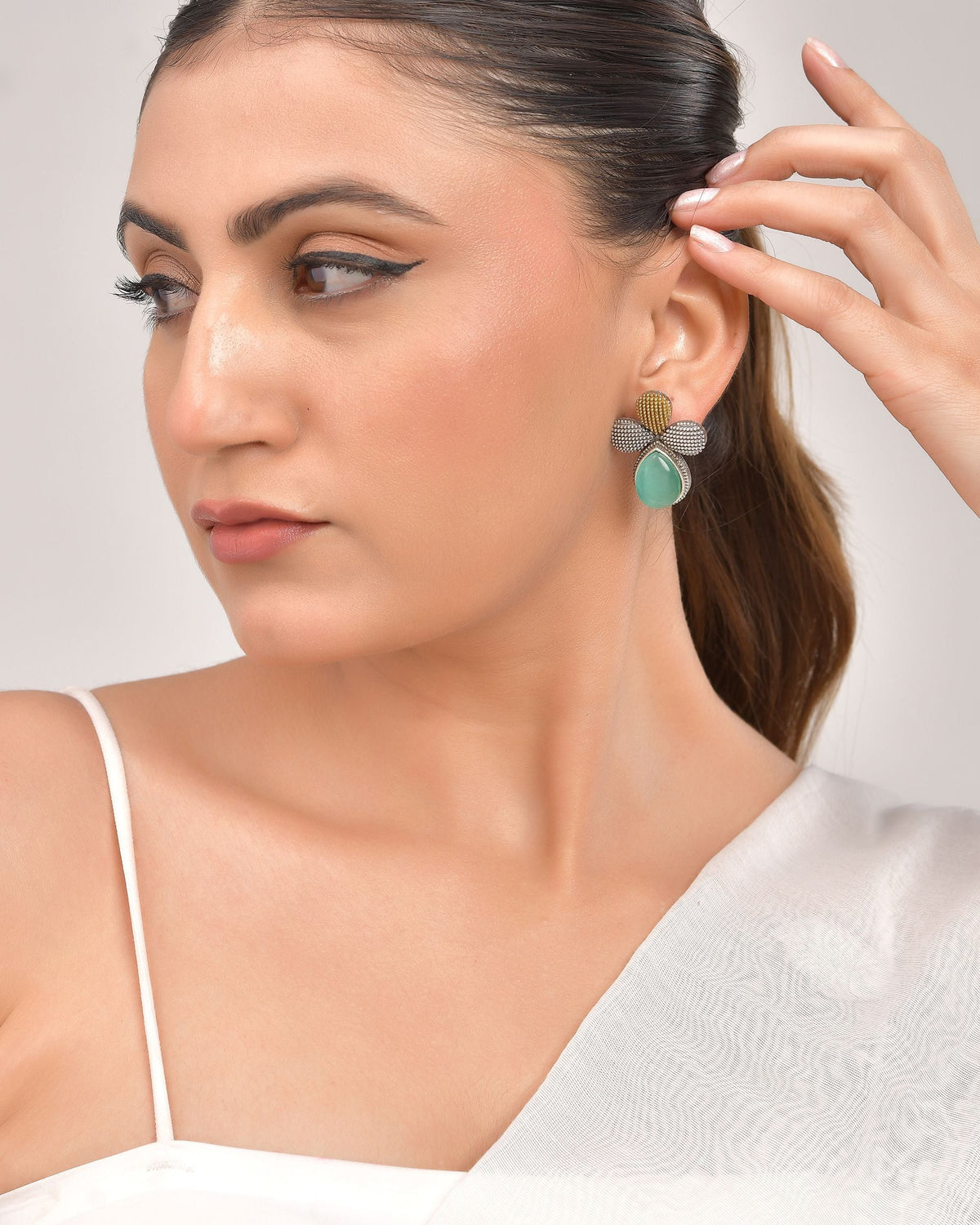 VOJ Silver Toned Teal Stone Studded Elegant Earrings | Grocsy