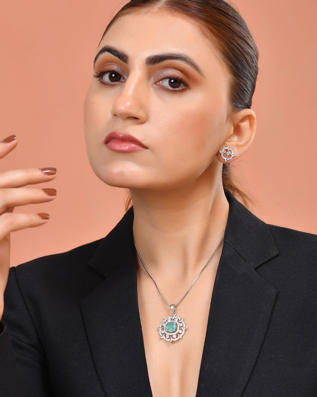 VOJ Silver Plated Sea Green Circulare Stone Studded Sun Shaped Ad Pendant With Chain Set | Grocsy