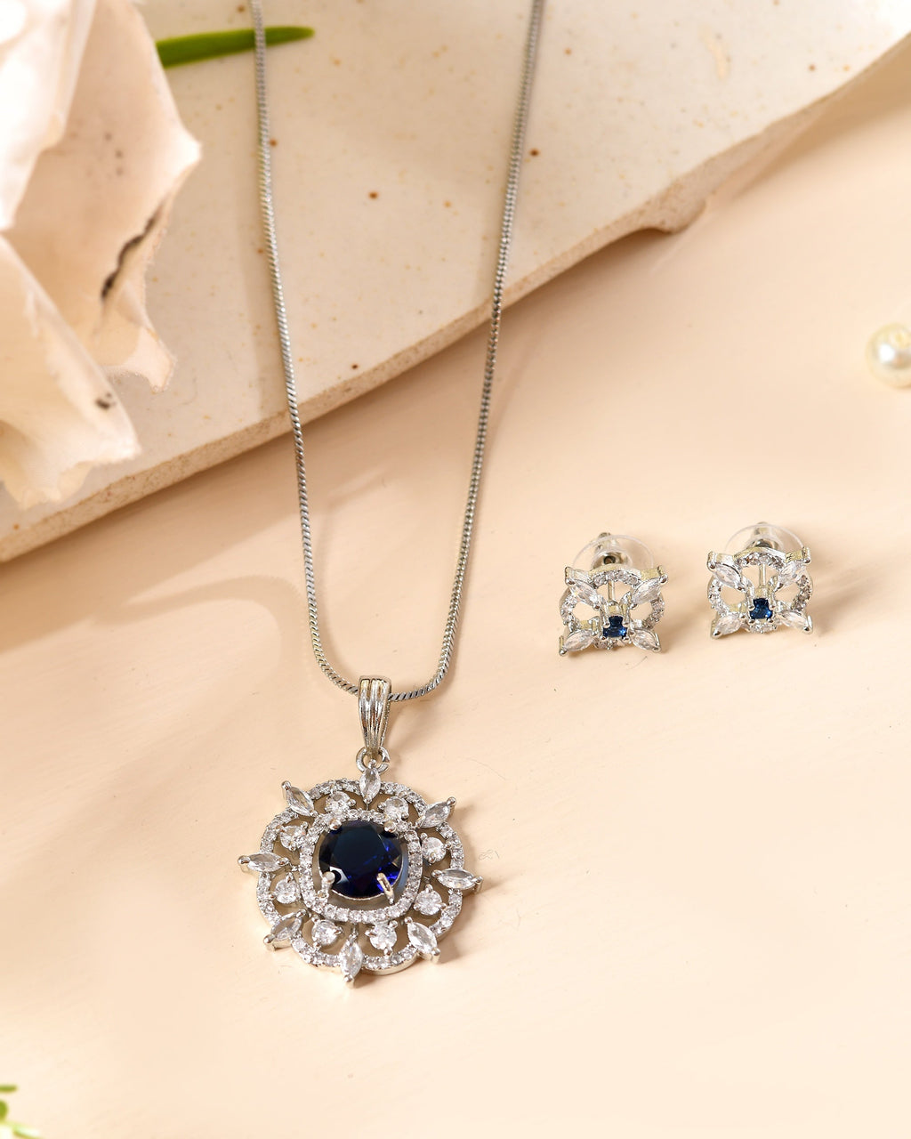 VOJ Silver Plated Blue Circular Stone Studded Sun Shaped Ad Pendant With Chain Set | Grocsy