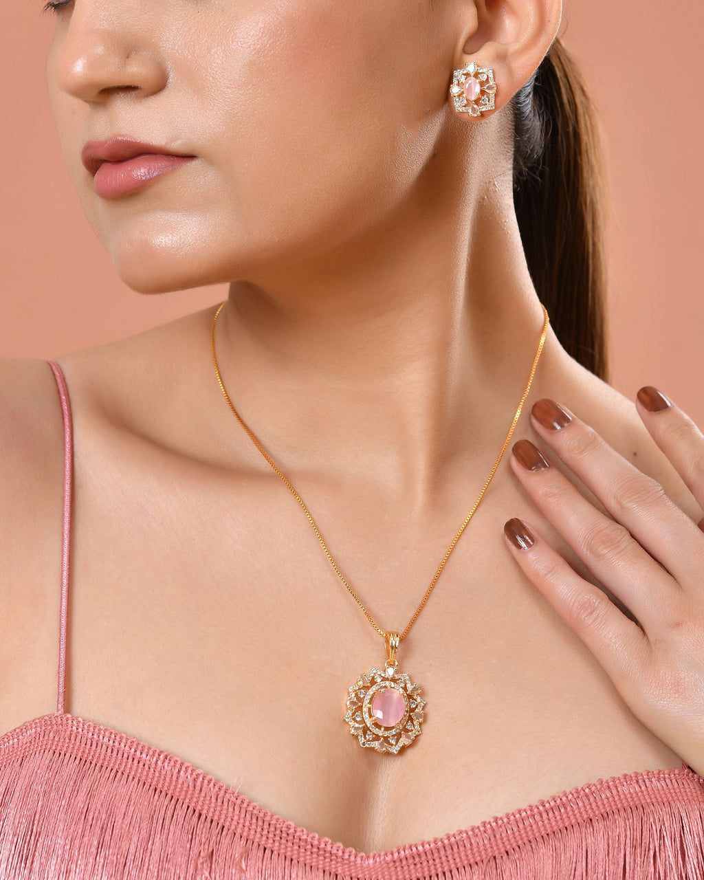 VOJ Gold Toned Baby Pink Oval Stone Studded Sun Shaped Ad Pendant With Chain Set | Grocsy