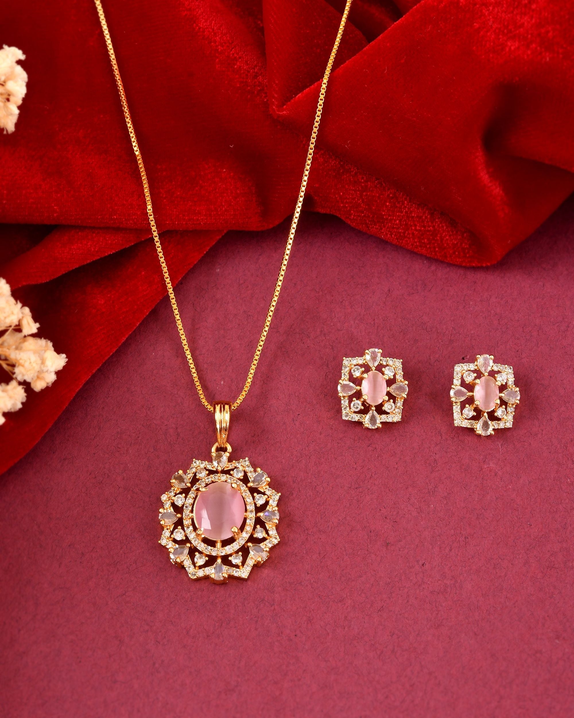VOJ Gold Toned Baby Pink Oval Stone Studded Sun Shaped Ad Pendant With Chain Set | Grocsy
