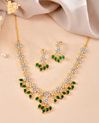 VOJ Gold-Toned Ad Stone Studded Floral Necklace & Earrings Set With Green Stone Drops | Grocsy