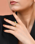 VOJ Gold Plated Snake Design Ad Ring With Green Stone | Grocsy