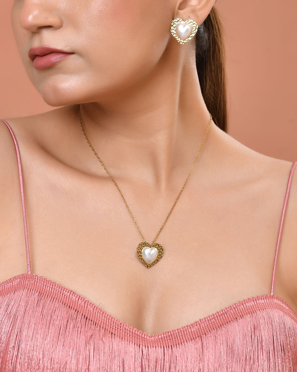 VOJ Gold Toned Pearl Studded Heart Shaped Pendant And Earrings With Chain Set | Grocsy