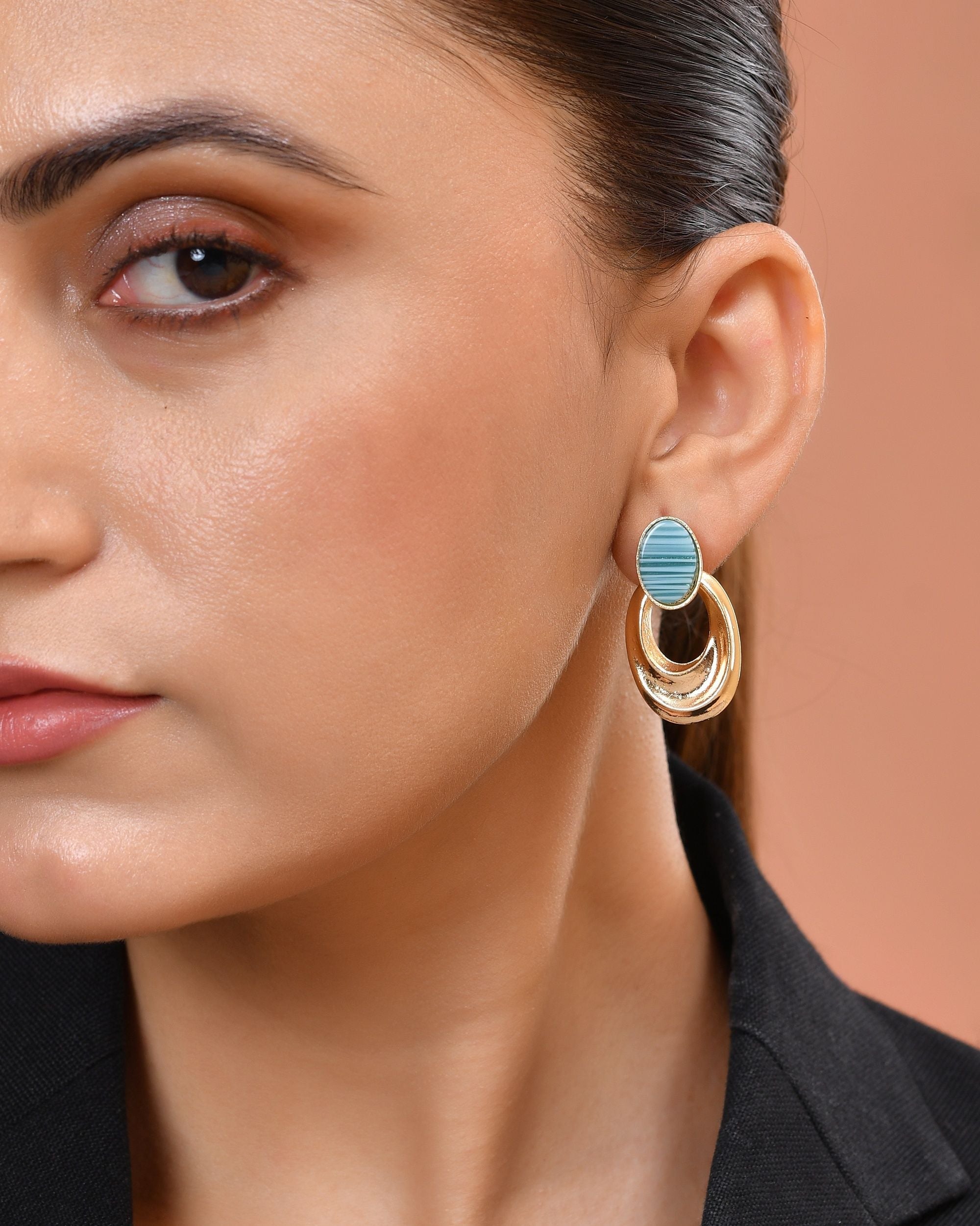 VOJ Gold Plated Blue Stone Studded Oval Shaped Earrings | Grocsy