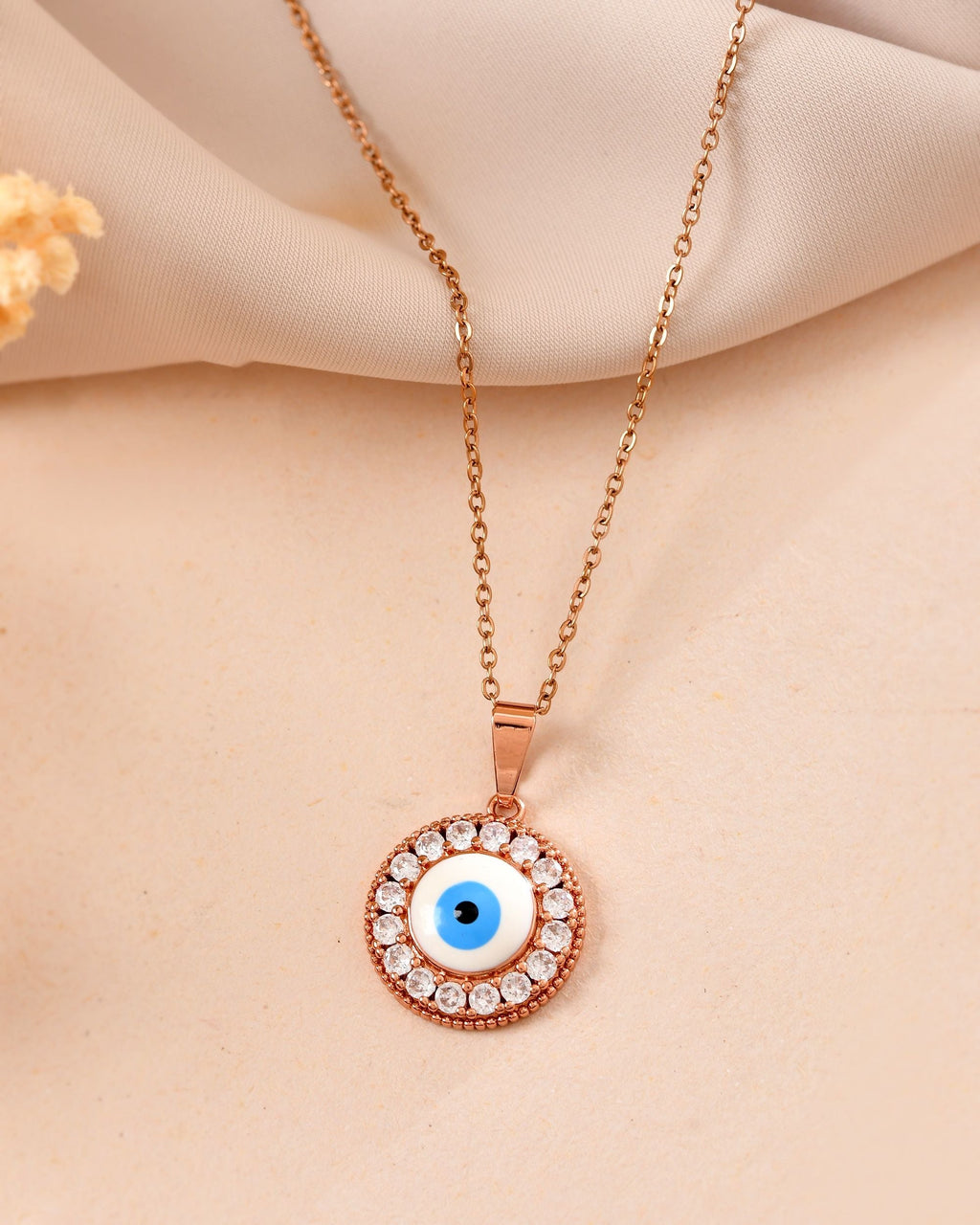 VOJ Rose Gold Plated Ad Stone Studded Evil Eye Pendant With Chain | Grocsy