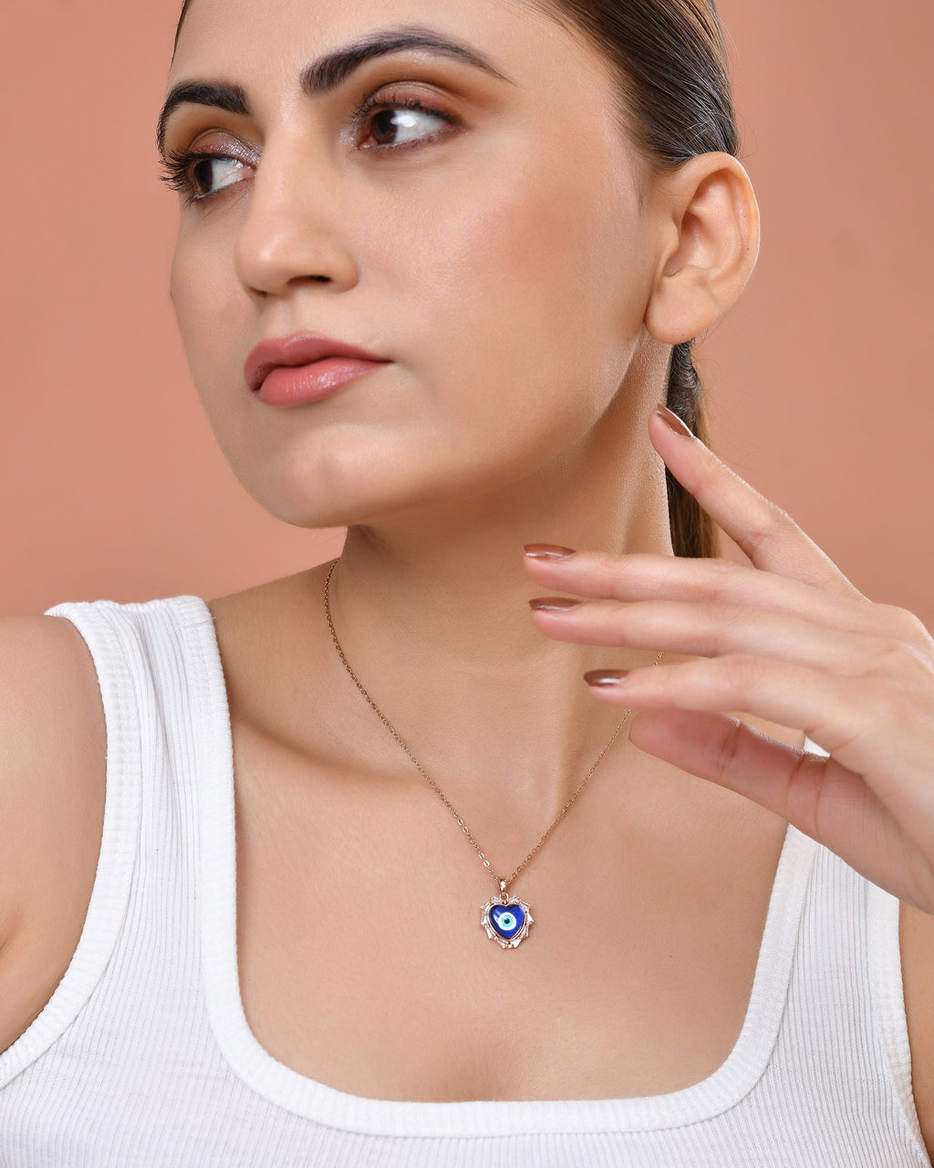 VOJ Rose Gold Plated Heart Shaped Evil Eye Pendant With Chain | Grocsy
