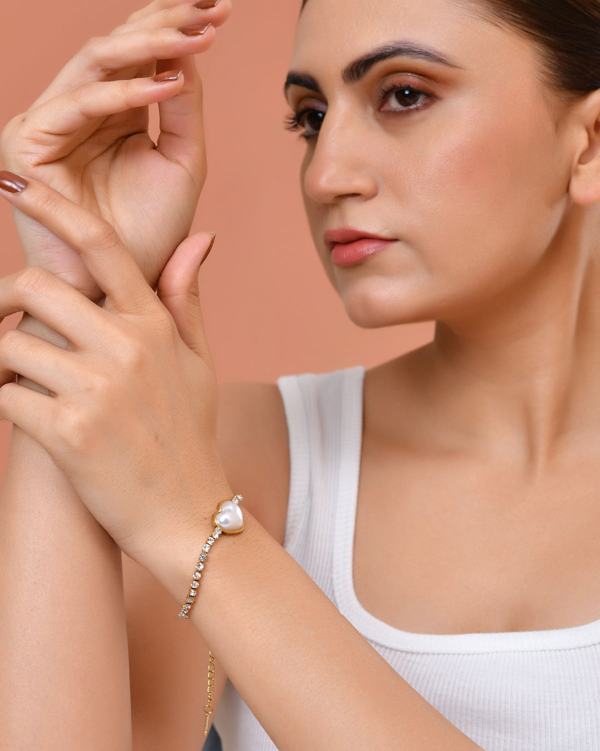 VOJ Gold Plated Ad Stone Studded With Heart Shaped Pearl Bracelet For Women | Grocsy