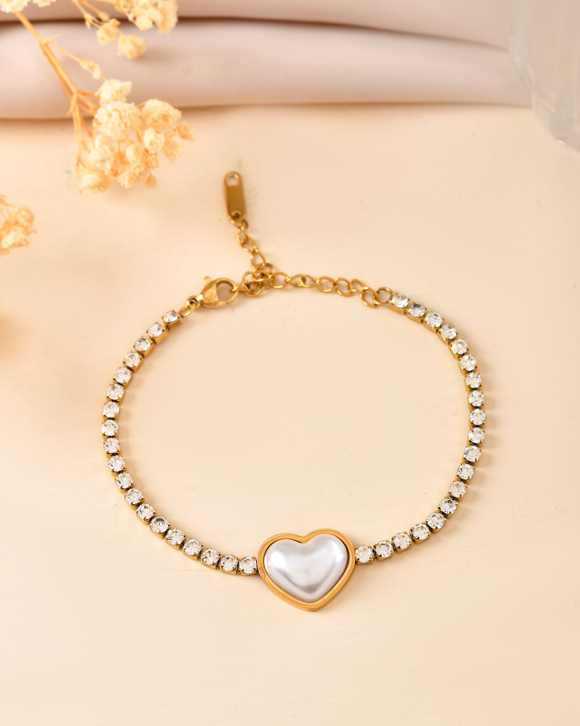 VOJ Gold Plated Ad Stone Studded With Heart Shaped Pearl Bracelet For Women | Grocsy