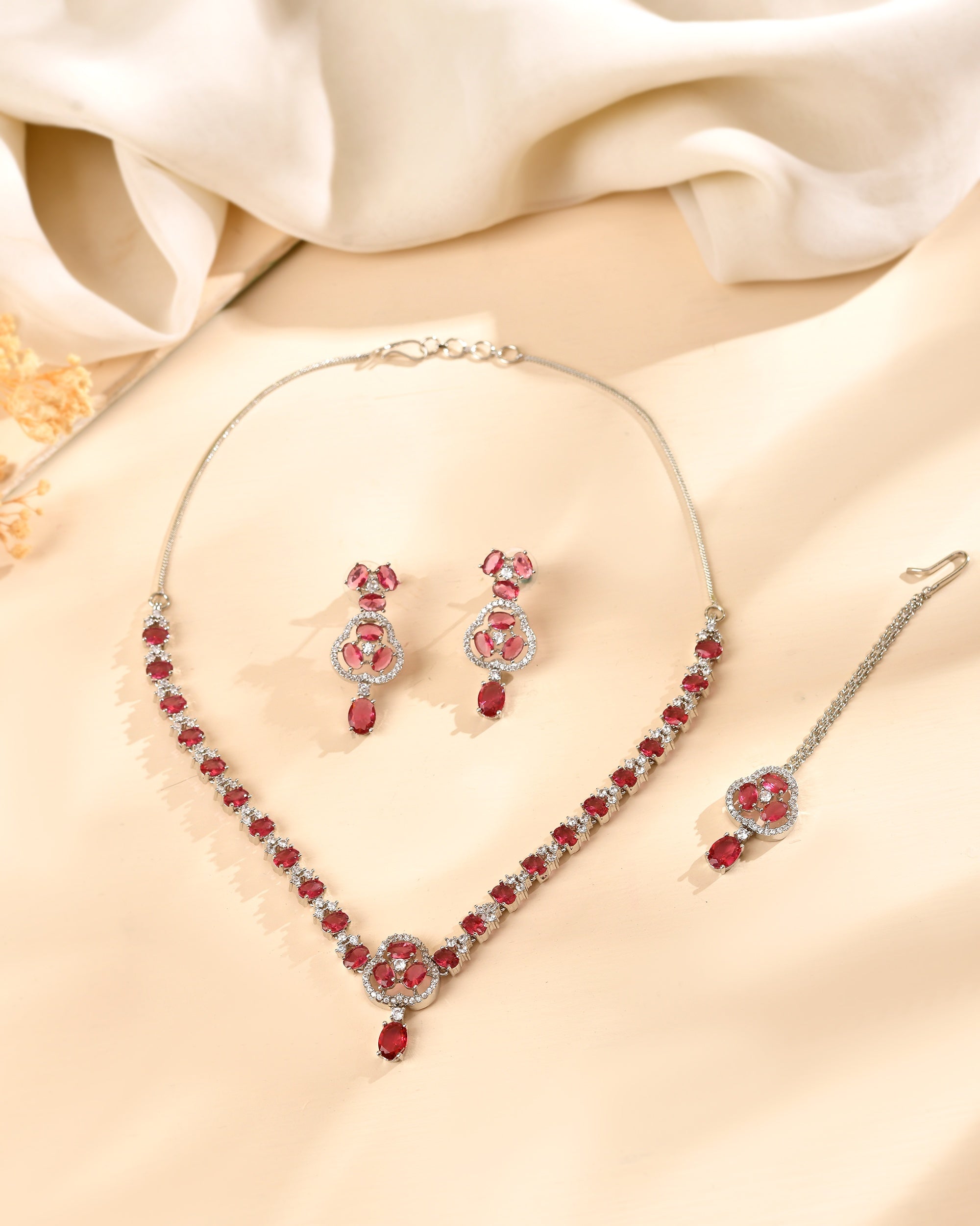 VOJ Silver Plated Ruby Red Stone Studded Ad Jewellery Set With Maang Tikka | Grocsy