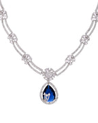 VOJ Silver Plated Blue Tear Drop Shaped Stone And Ad Stone Jewellery Set With Maang Tikka | Grocsy