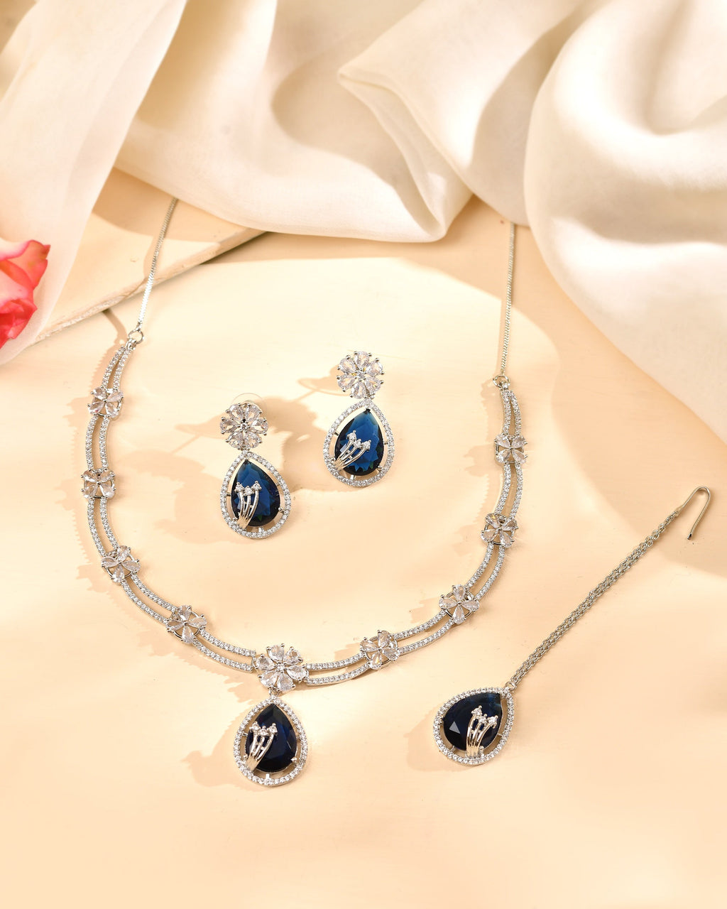 VOJ Silver Plated Blue Tear Drop Shaped Stone And Ad Stone Jewellery Set With Maang Tikka | Grocsy